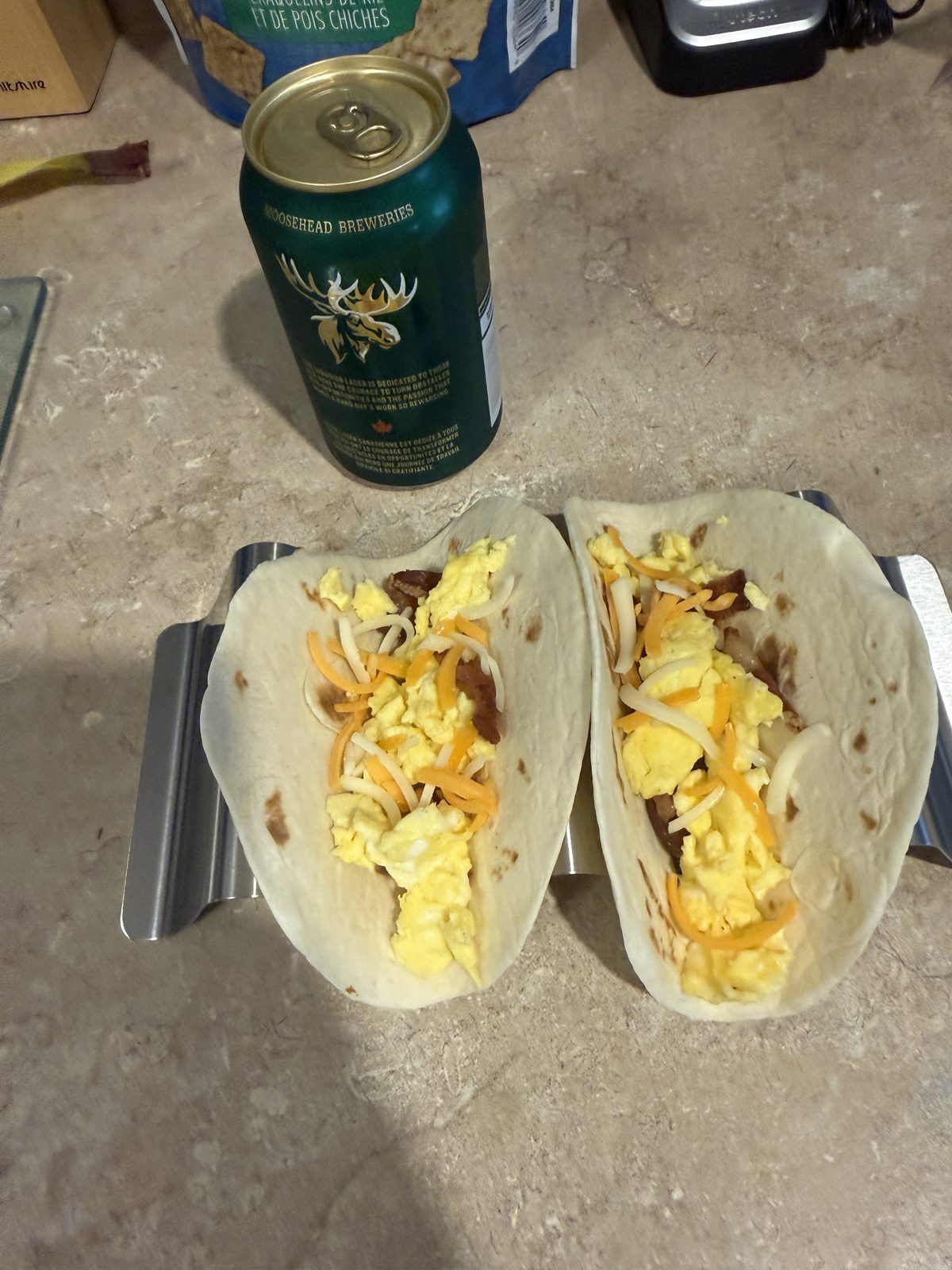A Moosehead and two breakfast tacos at the start